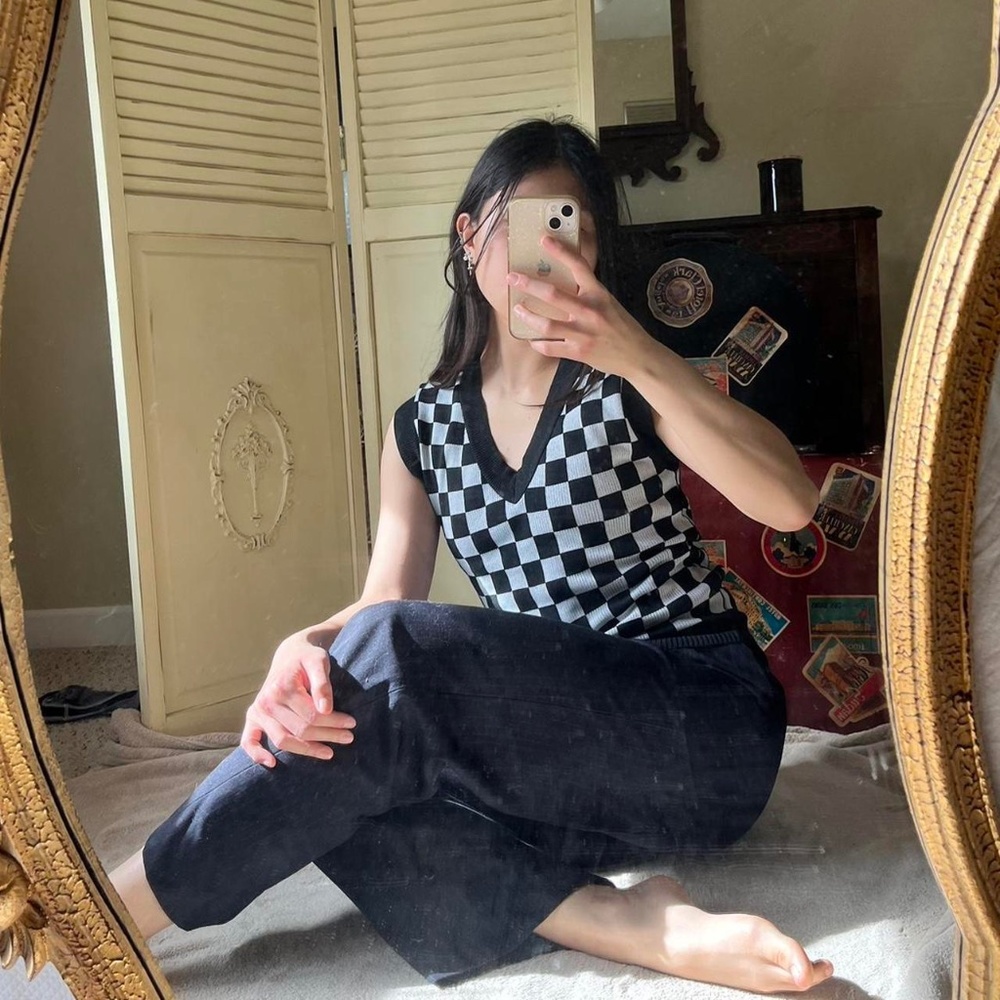 Black and white checkered vest